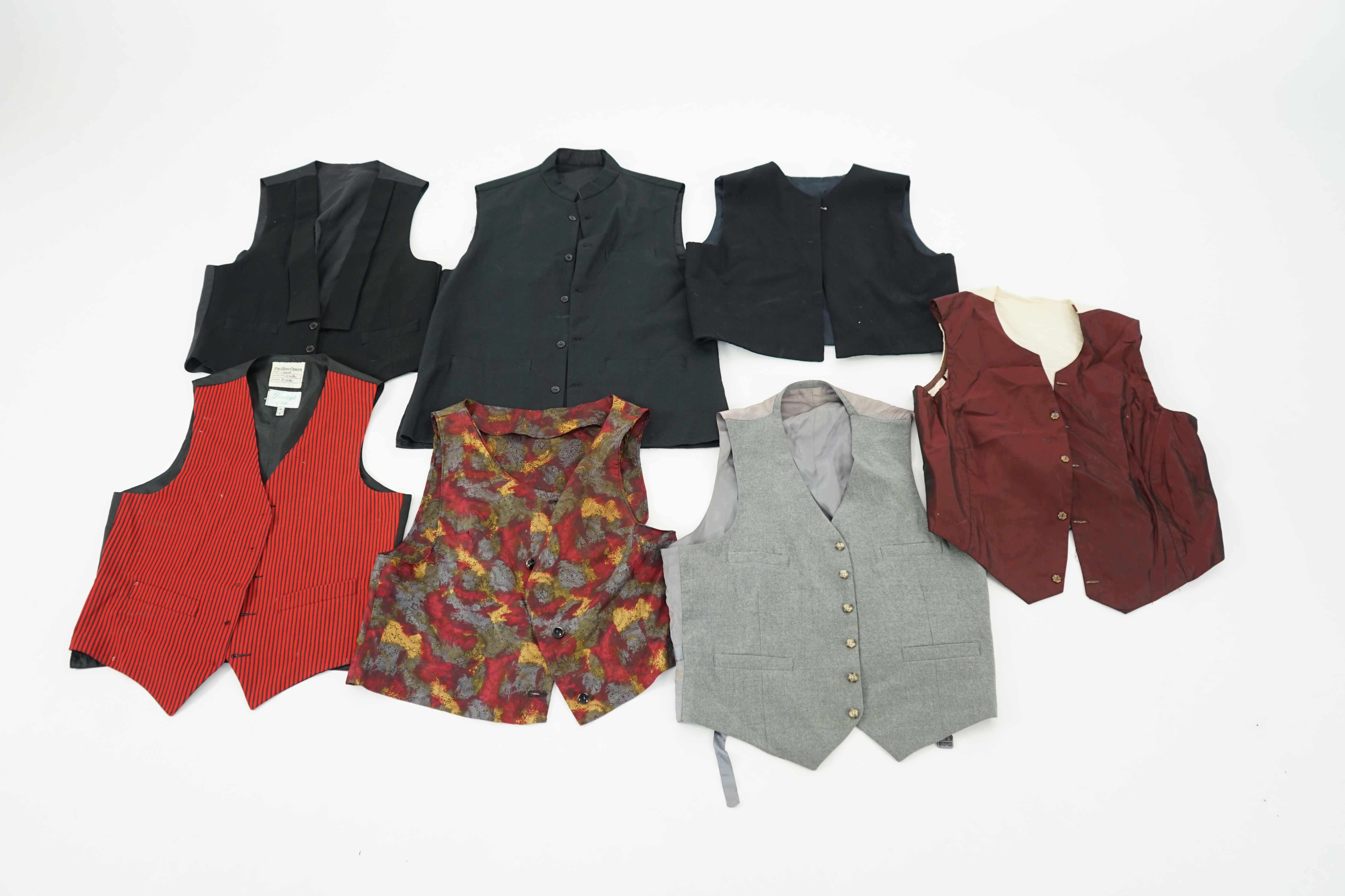 Five assorted men's period waistcoats (darker colours). Ex Pavilion Opera.